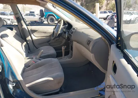 2001 Toyota Corolla Ce z USA, uszkodzony, nr VIN 1NXBR12E31Z502553